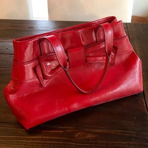 Kate Spade red patent leather handbag with bow